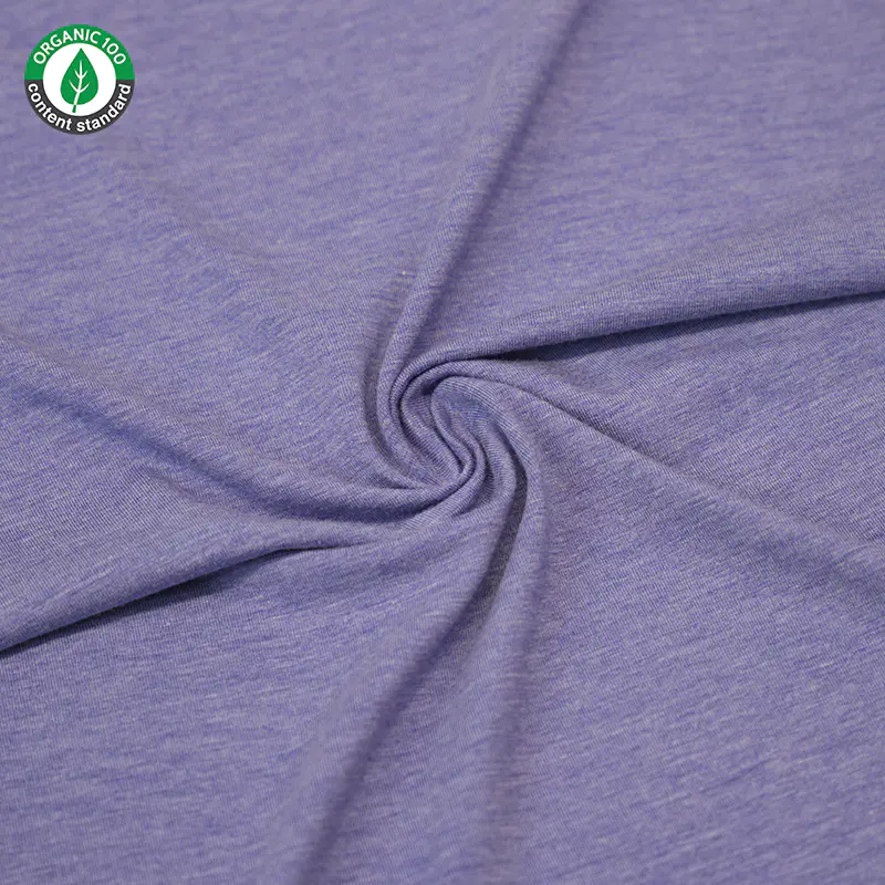 Hoe verhouden organische katoen, gerecycled polyester (RPET) en bamboevezel zich in termen van duurzaamheid?