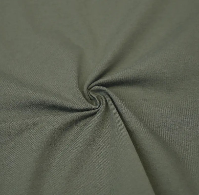 Wat zijn de kenmerken van biologische katoenen spandex jersey stof in termen van comfort en zachtheid?